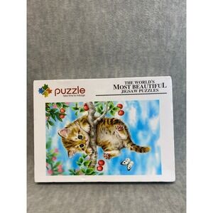 The Worlds Most Beautiful Jigsaw Puzzles‎ Kitten Hanging From Tree 1,000 Piece